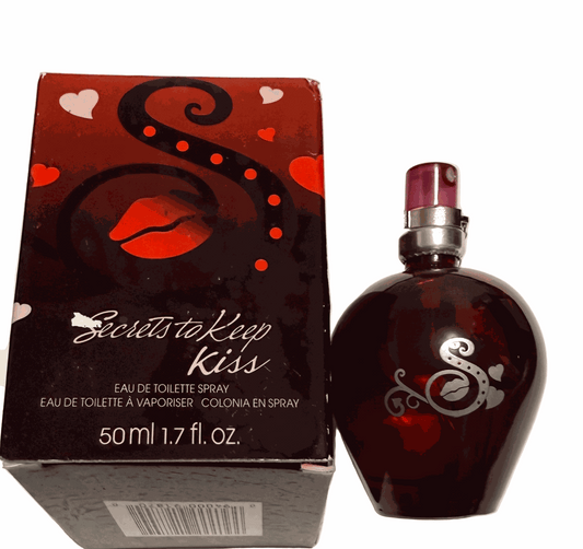 Secrets to Keep Kiss eau de toilette spray in heart-shaped bottle and decorative box with red lips and hearts design