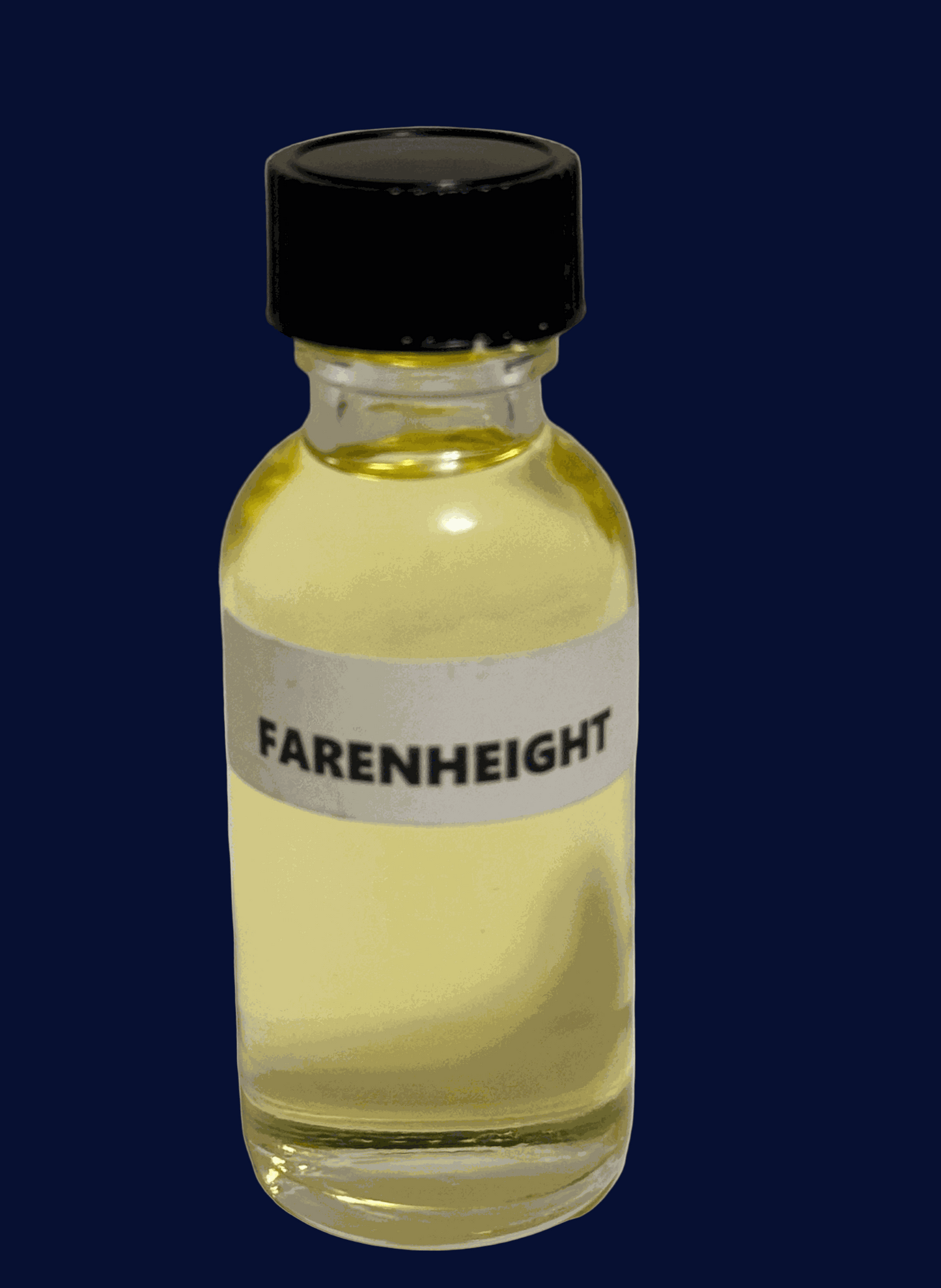 small bottle of Fahrenheit Perfume Oil with warm amber and woody notes