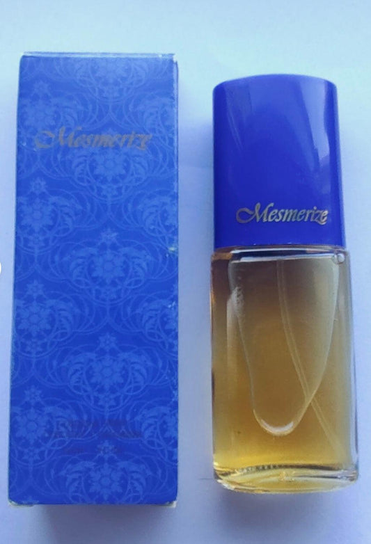 Mesmerize Cologne Spray for women with warm oriental floral and amber notes in 1 fl oz bottle and blue packaging