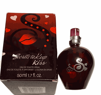 Secrets to Keep Kiss eau de toilette spray 1.7 fl oz in a heart-shaped deep red bottle with silver script S and matching red and black box with hearts and lips design