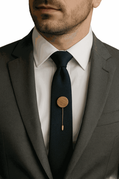 Man wearing suit with Mahogany Heritage Accent Pin on black tie