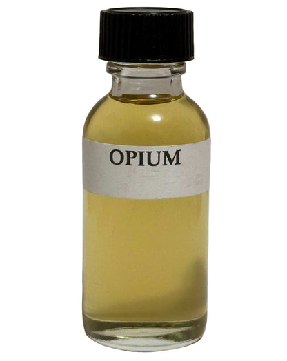 Opium Perfume Oil bottle with amber-colored fragrance and black cap