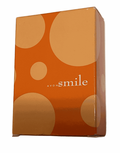 Smile Eau De Parfum box with orange and beige circular design, 1.7 fl oz perfume packaging