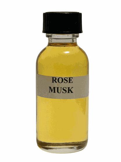 Small vial of Móntale Rose Musk perfume oil with black cap and yellow liquid inside