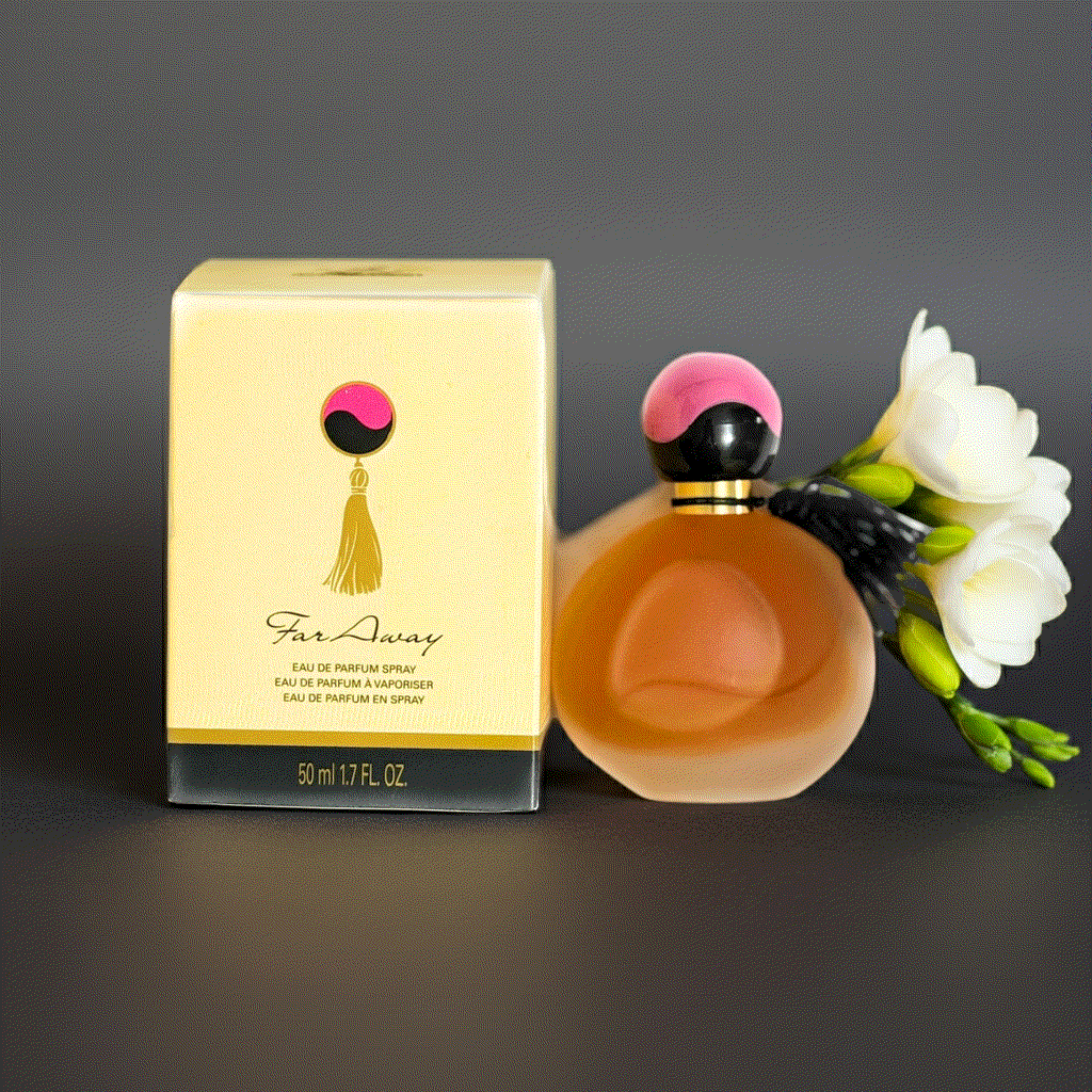 Far Away Original Eau De Perfume 1.7 fl oz warm amber soft oriental fragrance bottle with flower and packaging box